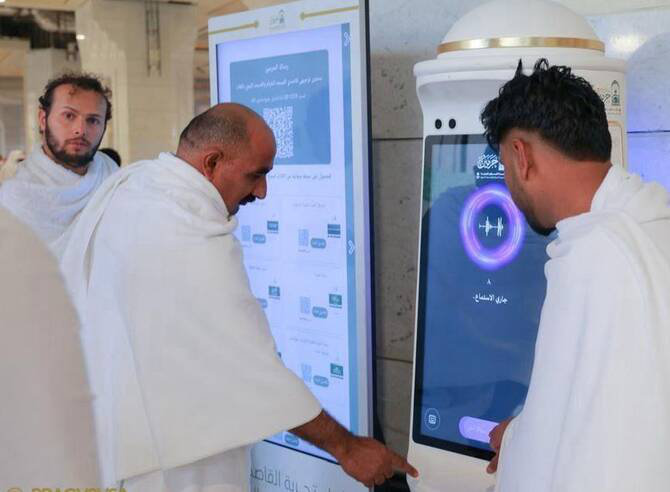 a photo manara robot acting with people